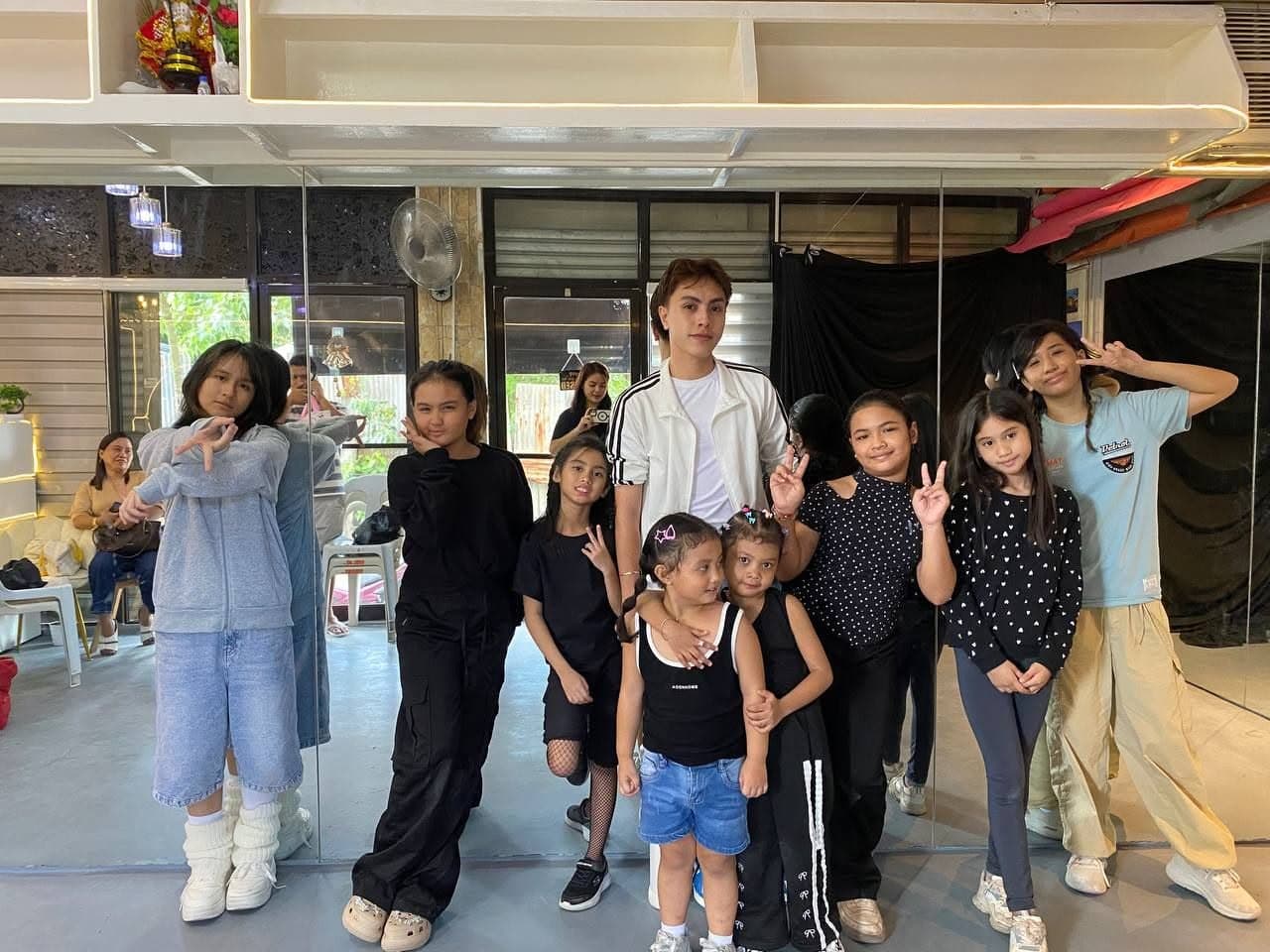 Dance class with instructor in studio